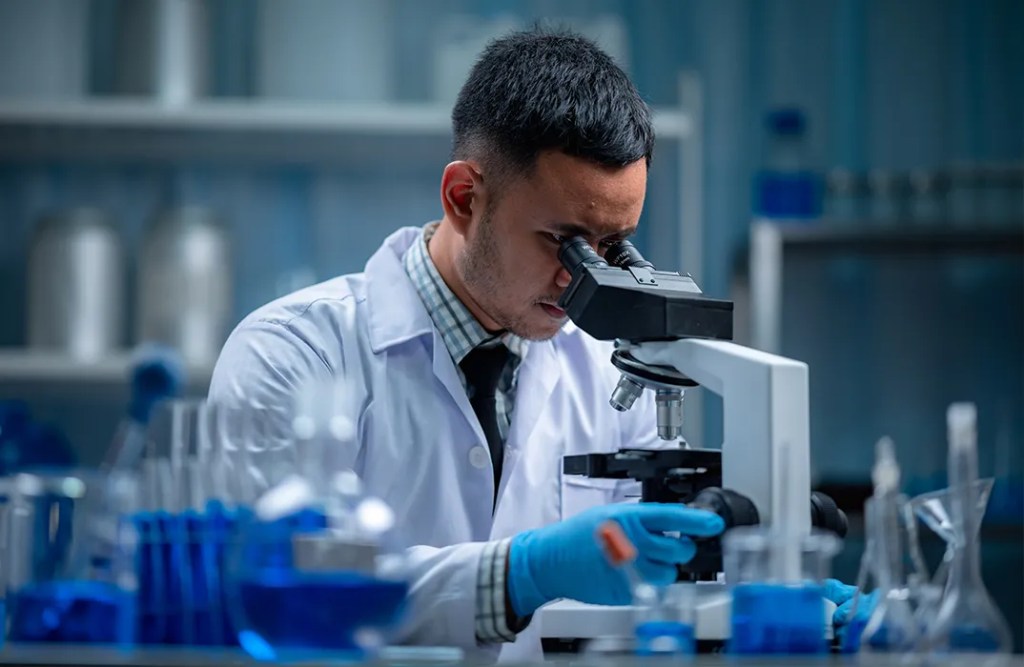 Forensic science student conducting laboratory research