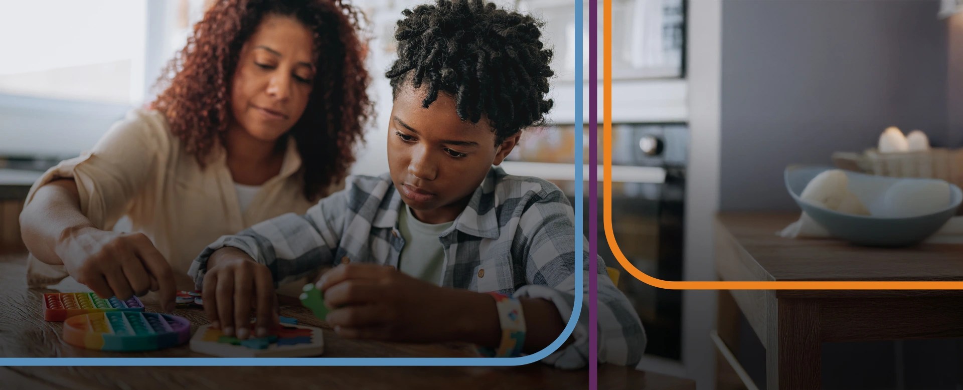 A child with a parent or therapist using a toy.